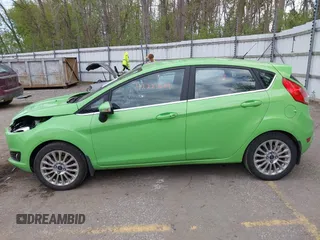 2014 Ford Fiesta Titanium z VIN 3FADP4FJ8EM165941, wystawiony jako IAAI lot #42221629 z przebiegiem 105 582 mil mil oraz . Historia ofert i sprzedaży dostępna na DreamBid. Obrazek 15.