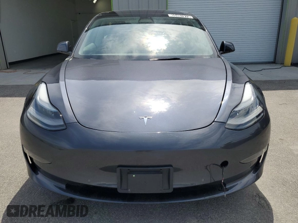 2022 Tesla Model 3 Long Range with VIN 5YJ3E1EB4NF289326, listed as a Copart auction lot 55457975 with 52,249 mi miles and Clean Title. Bid and sale history available at DreamBid. Image 5.