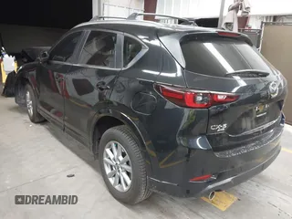 2024 Mazda CX-5 S Select with VIN JM3KFBBL1R0489541, listed as a IAAI auction lot 41820699 with 12,072 mi miles and . Bid and sale history available at DreamBid. Image 3.