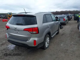 2014 Kia Sorento EX with VIN 5XYKUDA71EG456929, listed as a IAAI auction lot 42012720 with 128,557 mi miles. Bid and sale history available at carsss.com. Image 4.
