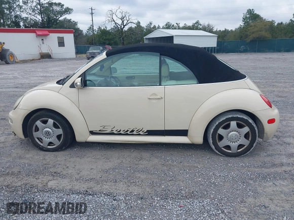 2004 Volkswagen Beetle with VIN 3VWCM21Y64M306721, listed as a IAAI auction lot 41611494 with 183,434 mi miles and . Bid and sale history available at DreamBid. Image 14.