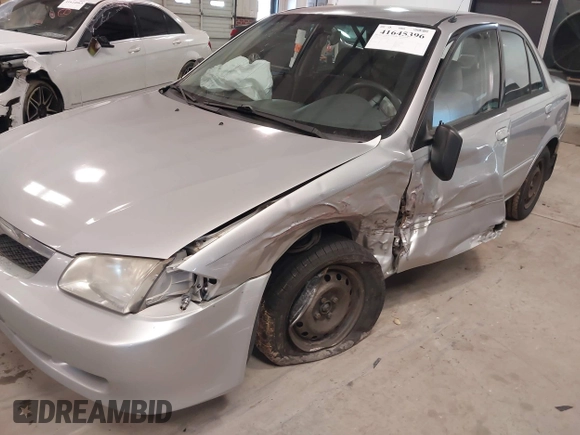 2000 Mazda Protege DX with VIN JM1BJ2226Y0206340, listed as a IAAI auction lot 41645396 with 238,500 mi miles and . Bid and sale history available at DreamBid. Image 6.