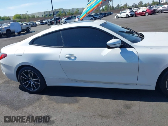 2022 BMW 4 Series 430i xDrive with VIN WBA73AP03NCH61029, listed as a IAAI auction lot 42327779 with 104,860 mi miles and . Bid and sale history available at DreamBid. Image 14.