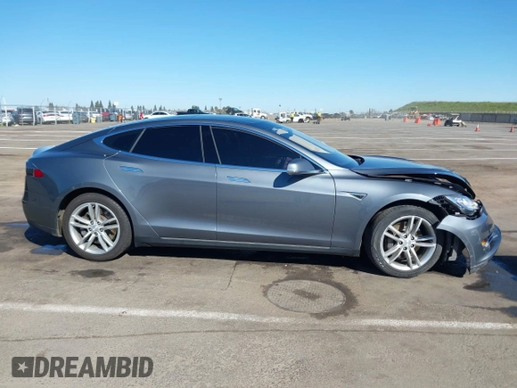 2014 Tesla Model S 60 with VIN 5YJSA1S10EFP32851, listed as a IAAI auction lot 41730746 with 91,657 mi miles and . Bid and sale history available at DreamBid. Image 13.