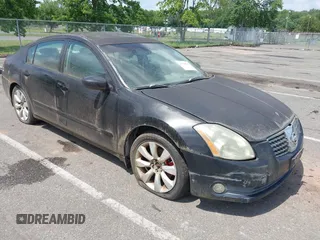 2004 Nissan Maxima SE with VIN 1N4BA41E64C822447, listed as a IAAI auction lot 42720601 with 199,717 mi miles and . Bid and sale history available at DreamBid. Image 1.