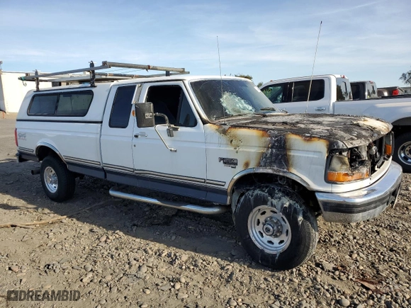 1997 Ford F-250 HD with VIN 1FTHX26F7VEB58870, listed as a Copart auction lot 72439034 with 0 mi miles and Salvage Title. Bid and sale history available at carsss.com. Image 4.