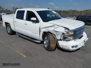 2015 Chevrolet Silverado 1500 LT with VIN 3GCUKREC9FG190338, listed as a IAAI auction lot 41793915 with 116,558 mi miles. Bid and sale history available at carsss.com. Image 1.