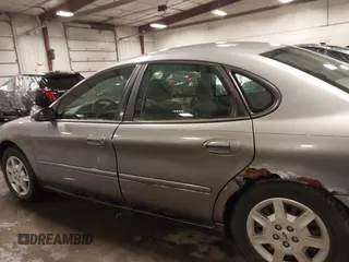 2006 Ford Taurus SE with VIN 1FAFP53U86A113947, listed as a IAAI auction lot 41753927 with 203,867 mi miles. Bid and sale history available at carsss.com. Image 14.