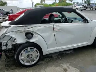 2019 Volkswagen Beetle S with VIN 3VW5DAAT9KM507517, listed as a Copart auction lot 60427665 with 11,178 mi miles and Salvage title. Bid and sale history available at DreamBid. Image 14.