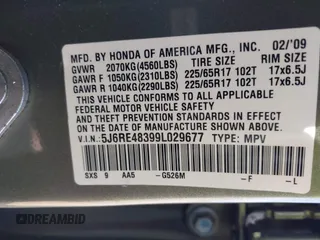 2009 Honda CR-V LX with VIN 5J6RE48399L029677, listed as a IAAI auction lot 38701558 with 136,294 mi miles. Bid and sale history available at carsss.com. Image 9.