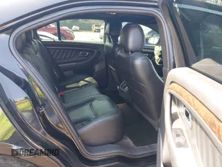 2014 Ford Taurus Limited with VIN 1FAHP2F80EG104984, listed as a IAAI auction lot 41910463 with 174,034 mi miles. Bid and sale history available at carsss.com. Image 8.