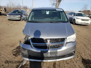 2014 Dodge Grand Caravan American Value with VIN 2C4RDGBG5ER185593, listed as a Copart auction lot 48768065 with 167,834 mi miles and Salvage Title. Bid and sale history available at DreamBid. Image 5.