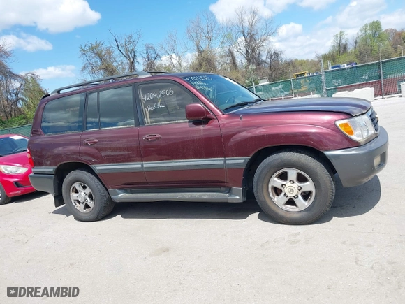 2002 Toyota Land Cruiser with VIN JTEHT05J422022565, listed as a IAAI auction lot 42042565 with 550,000 mi miles. Bid and sale history available at carsss.com. Image 13.