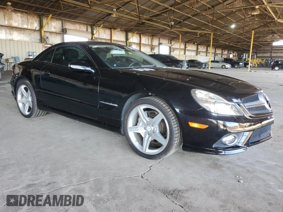 2011 Mercedes-Benz SL 550 z VIN WDBSK7BAXBF165859, wystawiony jako Copart lot #80166084 z przebiegiem 33 119 mil mil oraz Czysty tytuł • Clean title. Historia ofert i sprzedaży dostępna na DreamBid. Obrazek 4.