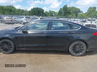 2016 Ford Fusion SE with VIN 3FA6P0HD8GR380945, listed as a IAAI auction lot 42626820 with 112,497 mi miles and . Bid and sale history available at DreamBid. Image 14.