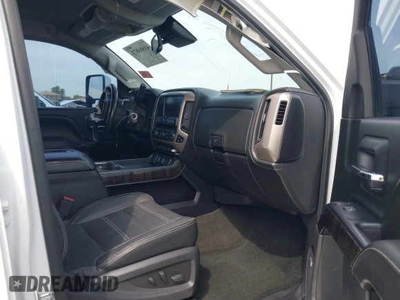 2016 GMC Sierra 2500HD Denali z VIN 1GT12UE88GF170375, wystawiony jako IAAI lot #41885873 z przebiegiem 150 108 mil mil oraz . Historia ofert i sprzedaży dostępna na DreamBid. Obrazek 5.