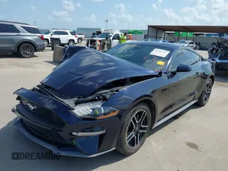 2021 Ford Mustang EcoBoost with VIN 1FA6P8TH7M5134461, listed as a IAAI auction lot 42526727 with 56,494 mi miles and . Bid and sale history available at DreamBid. Image 2.