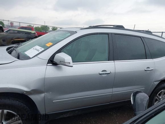2016 Chevrolet Traverse LT z VIN 1GNKRHKDXGJ115343, wystawiony jako IAAI lot #42246084 z przebiegiem 148 021 mil mil oraz . Historia ofert i sprzedaży dostępna na DreamBid. Obrazek 14.