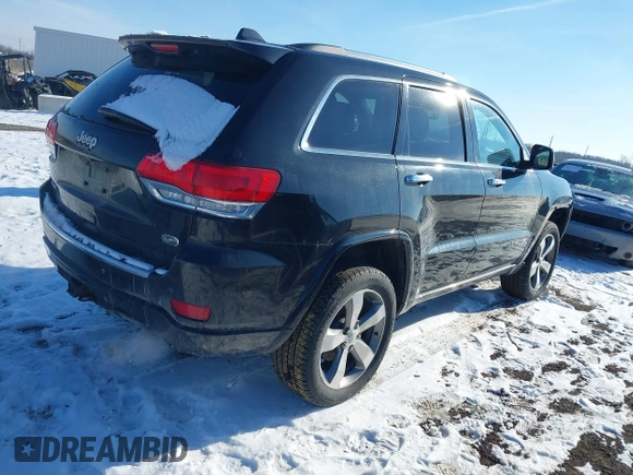 2015 Jeep Grand Cherokee Overland z VIN 1C4RJFCG3FC726748, wystawiony jako IAAI lot #41369715 z przebiegiem 120 905 mil mil oraz . Historia ofert i sprzedaży dostępna na DreamBid. Obrazek 4.