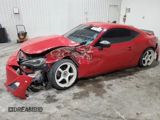 2016 Scion FR-S z VIN JF1ZNAA10G9702689, wystawiony jako Copart lot #55116515 z przebiegiem 109 460 mil mil oraz Szkoda całkowita • Salvage title. Historia ofert i sprzedaży dostępna na DreamBid. Obrazek 1.