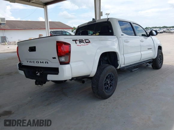 2022 Toyota Tacoma SR5 with VIN 3TMAZ5CN2NM163171, listed as a IAAI auction lot 42492852 with Not provided miles and . Bid and sale history available at DreamBid. Image 4.