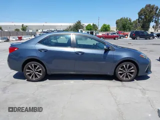 2017 Toyota Corolla L with VIN 5YFBURHE6HP575352, listed as a IAAI auction lot 42417810 with 248,626 mi miles and . Bid and sale history available at DreamBid. Image 13.