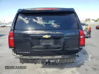 2017 Chevrolet Suburban LS with VIN 1GNSCGECXHR351539, listed as a Copart auction lot 87070214 with 246,129 mi miles and Salvage title. Bid and sale history available at DreamBid. Image 6.