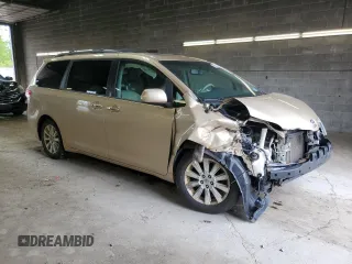 2012 Toyota Sienna XLE with VIN 5TDDK3DC1CS047265, listed as a Copart auction lot 58500275 with 203,548 mi miles and Salvage title. Bid and sale history available at DreamBid. Image 4.
