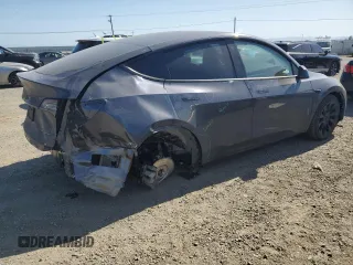 2022 Tesla Model Y Long Range z VIN 7SAYGDEE6NF429701, wystawiony jako Copart lot #58585665 z przebiegiem 86 537 mil mil oraz Szkoda całkowita • Salvage title. Historia ofert i sprzedaży dostępna na DreamBid. Obrazek 3.