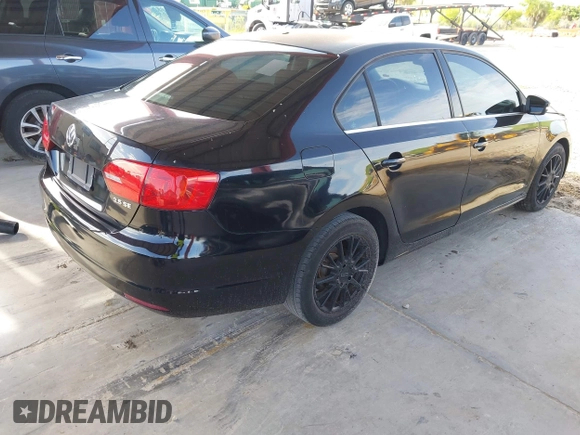 2013 Volkswagen Jetta SE with VIN 3VWDX7AJ8DM215350, listed as a IAAI auction lot 42642122 with 164,357 mi miles and . Bid and sale history available at DreamBid. Image 4.