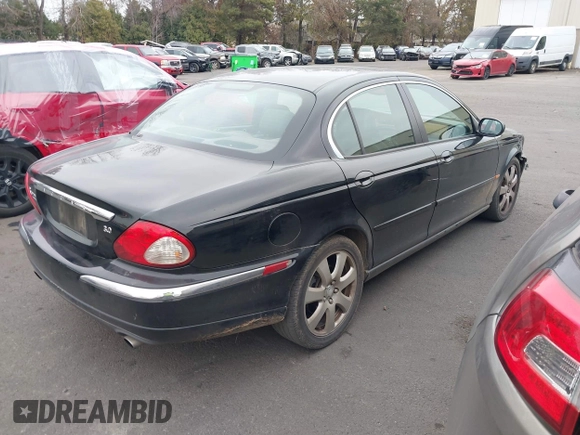 2006 Jaguar X-Type with VIN SAJWA51A16WE68650, listed as a IAAI auction lot 41461291 with 135,332 mi miles and . Bid and sale history available at DreamBid. Image 4.