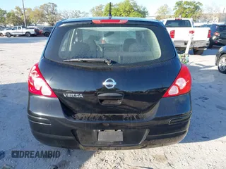 2009 Nissan Versa 1.8 SL with VIN 3N1BC13E79L476570, listed as a IAAI auction lot 41804750 with 160,449 mi miles. Bid and sale history available at carsss.com. Image 16.