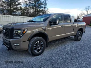 2022 Nissan Titan XD Platinum Reserve with VIN 1N6AA1FB9NN104042, listed as a Copart auction lot 75653184 with 28,709 mi miles and Salvage Title. Bid and sale history available at carsss.com. Image 1.