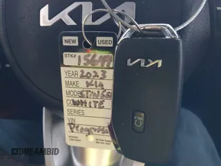 2023 Kia Stinger GT2 with VIN KNAE55LCXP6135128, listed as a IAAI auction lot 41281782 with 6,272 mi miles. Bid and sale history available at carsss.com. Image 11.