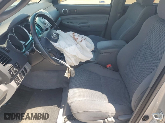 2006 Toyota Tacoma with VIN 5TELU42N76Z283409, listed as a Copart auction lot 61391785 with 77,799 mi miles and Salvage title. Bid and sale history available at DreamBid. Image 7.
