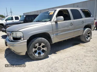 2001 GMC Yukon Denali z VIN 1GKEK63U41J314185, wystawiony jako Copart lot #58430005 z przebiegiem Nie podano mil oraz Szkoda całkowita • Salvage title. Historia ofert i sprzedaży dostępna na DreamBid. Obrazek 1.