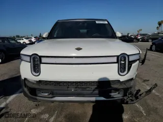 2024 Rivian R1S Adventure with VIN 7PDSGABA6RN043721, listed as a Copart auction lot 64231094 with 0 mi miles and Salvage Title. Bid and sale history available at carsss.com. Image 5.
