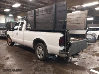 1999 Ford Super Duty F-250 XL with VIN 1FTNX20F1XEA40537, listed as a IAAI auction lot 41555982 with 187,608 mi miles. Bid and sale history available at carsss.com. Image 3.