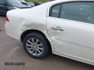 2009 Buick Lucerne CXL with VIN 1G4HD57M19U147653, listed as a IAAI auction lot 42166780 with 84,794 mi miles and . Bid and sale history available at DreamBid. Image 6.