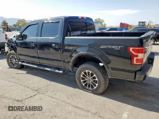 2019 Ford F-150 XL with VIN 1FTEW1EP2KFC25018, listed as a Copart auction lot 63105465 with 60,331 mi miles and Salvage title. Bid and sale history available at DreamBid. Image 2.