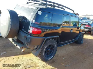 2008 Toyota FJ Cruiser with VIN JTEBU11F78K012714, listed as a IAAI auction lot 41524428 with 209,130 mi miles. Bid and sale history available at carsss.com. Image 4.