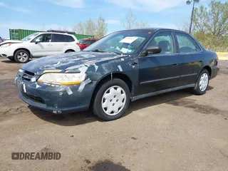 1999 Honda Accord LX with VIN 1HGCG6654XA145126, listed as a IAAI auction lot 42090873 with 76,421 mi miles and . Bid and sale history available at DreamBid. Image 2.