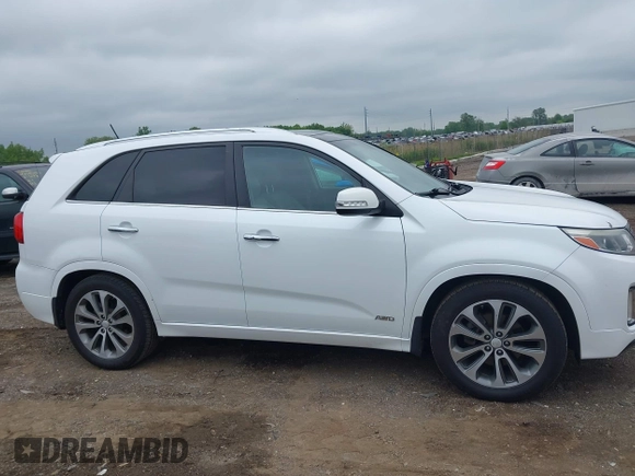 2014 Kia Sorento SX z VIN 5XYKWDA71EG520204, wystawiony jako IAAI lot #42388830 z przebiegiem 193 262 mil mil oraz . Historia ofert i sprzedaży dostępna na DreamBid. Obrazek 13.