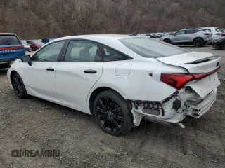2022 Toyota Avalon Hybrid XSE Nightshade with VIN 4T1EA1AB4NU012141, listed as a Copart auction lot 52931185 with 68,494 mi miles and Salvage Title. Bid and sale history available at DreamBid. Image 2.