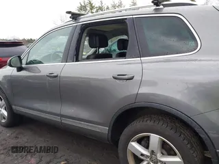 2013 Volkswagen Touareg Lux with VIN WVGEF9BP0DD005082, listed as a IAAI auction lot 41667026 with 140,148 mi miles and . Bid and sale history available at DreamBid. Image 15.