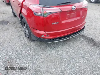 2017 Toyota RAV4 LE with VIN JTMBFREV8HJ161427, listed as a IAAI auction lot 42333851 with 121,161 mi miles and . Bid and sale history available at DreamBid. Image 6.