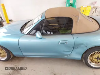 2001 Mazda MX-5 Miata z VIN JM1NB353510200779, wystawiony jako IAAI lot #42479005 z przebiegiem 157 269 mil mil oraz . Historia ofert i sprzedaży dostępna na DreamBid. Obrazek 14.