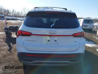 2023 Hyundai Santa Fe SEL z VIN 5NMS2DAJ8PH640338, wystawiony jako IAAI lot #41394066 z przebiegiem 19 064 mil mil oraz . Historia ofert i sprzedaży dostępna na DreamBid. Obrazek 16.