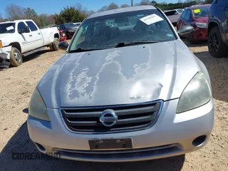 2002 Nissan Altima S with VIN 1N4AL11D92C225382, listed as a IAAI auction lot 41796261 with 207,812 mi miles. Bid and sale history available at carsss.com. Image 6.