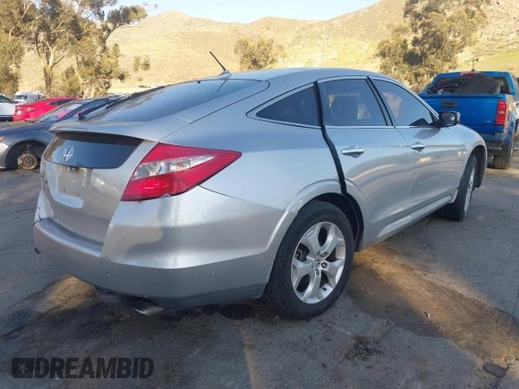 2010 Honda Crosstour EX-L z VIN 5J6TF1H59AL004799, wystawiony jako IAAI lot #41668347 z przebiegiem 214 195 mil mil oraz . Historia ofert i sprzedaży dostępna na DreamBid. Obrazek 4.